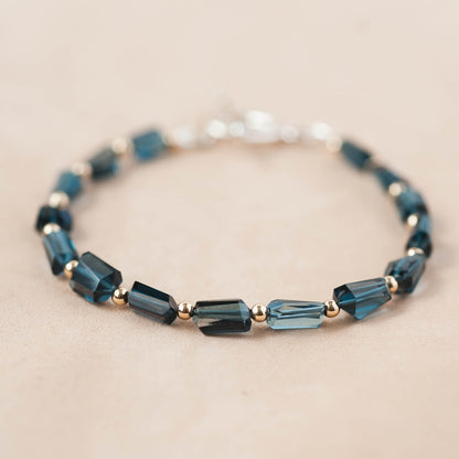 The Midnight Sovereign Bracelet – London Blue Topaz & 14k Gold Beads